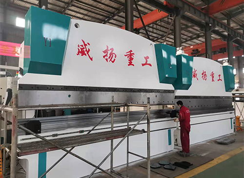 Potestne haec adductio Shearing Machina in an automated lineam productionis integrari cum systematibus pascendis et positis?